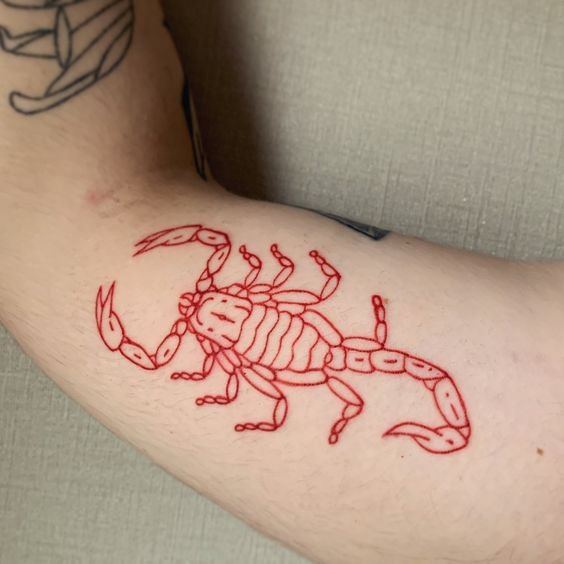 red scorpion tattoo