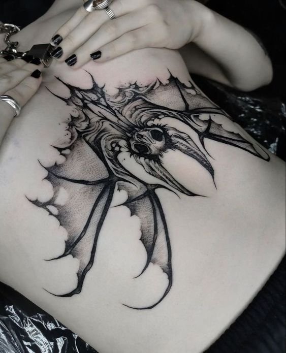 upside down bat tattoo